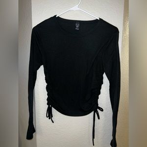 Windsor long sleeve knitted top. Soft with option to shorten/tighten on the side